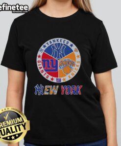 Alt Text: Ladies tee featuring combined logos of New York Yankees, Knicks, and Giants for sports fans in NYC.