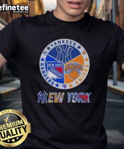 Alt Text: NYC sports t-shirt featuring Yankees, Knicks, and Rangers logos combined in a stylish design.