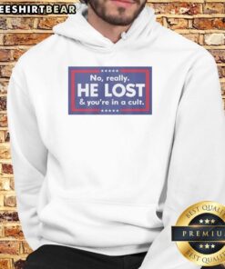 Man wearing 'Nice No Really He Lost And Youre In A Cult' hoodie, showcasing a bold statement in casual fashion.