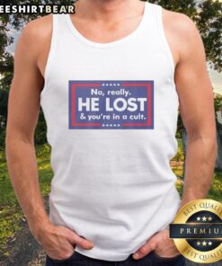 Person wearing a 'Nice No Really He Lost And Youre In A Cult' tank top, showcasing a bold statement on a casual outfit.