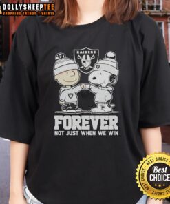 Ladies tee featuring Snoopy and Charlie Brown with 'Las Vegas Raiders Forever' slogan, perfect for fans.