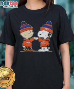 Charlie Brown and Snoopy fist bump in a Denver Broncos football ladies tee featuring Nice Peanuts design.