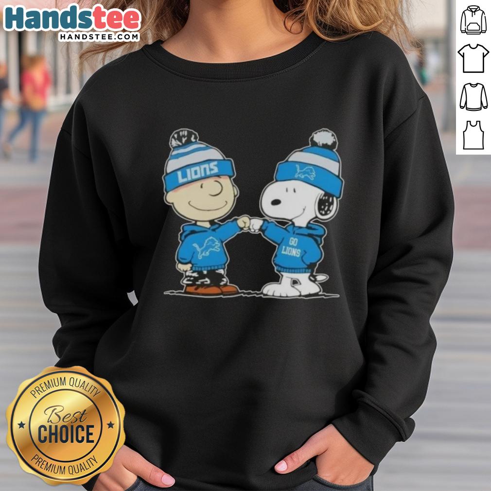 nice-peanuts-charlie-brown-fist-bump-snoopy-x-detroit-lions-football-sweatshirt Charlie Brown and Snoopy fist bump on a Detroit Lions football sweatshirt, perfect for Peanuts fans and sports lovers.