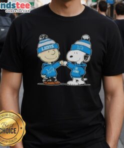 Nice Peanuts Charlie Brown fist bump with Snoopy on a Detroit Lions football T-shirt design, perfect for fans.