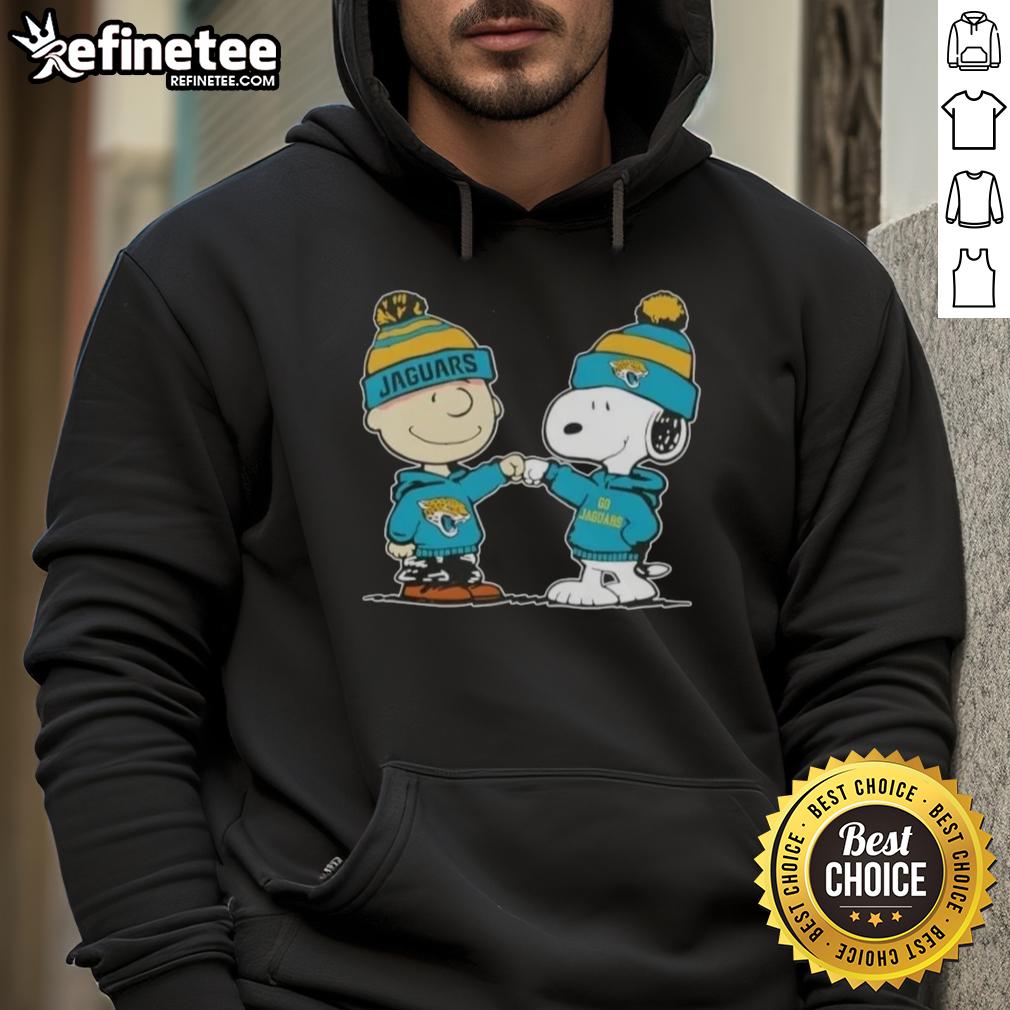 nice-peanuts-charlie-brown-fist-bump-snoopy-x-jacksonville-jaguars-football-hoodie Alt Text: Charlie Brown and Snoopy fist bump in Jacksonville Jaguars hoodie, celebrating friendship and football spirit.