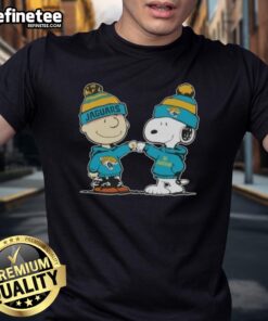 Nice Peanuts Charlie Brown fist bump with Snoopy on Jacksonville Jaguars football t-shirt design, perfect for fans.