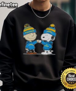Charlie Brown and Snoopy fist bump on a Los Angeles Chargers football sweatshirt featuring nice peanuts design.