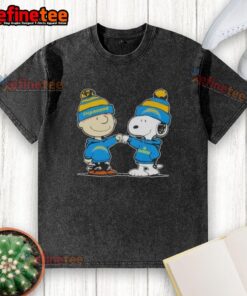 Alt Text: Charlie Brown and Snoopy fist bump in a Los Angeles Chargers washed t-shirt featuring nice peanuts design.