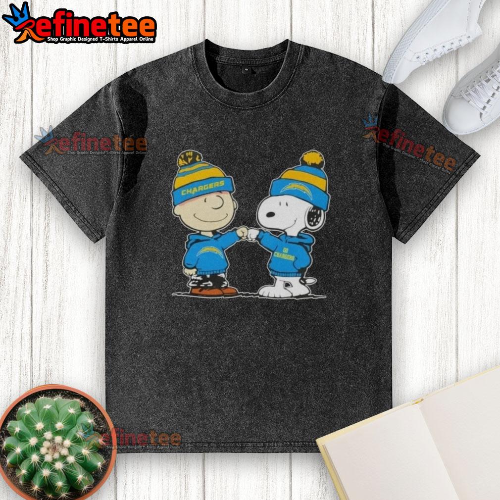 nice-peanuts-charlie-brown-fist-bump-snoopy-x-los-angeles-chargers-football-washed-t-shirt Alt Text: Charlie Brown and Snoopy fist bump in a Los Angeles Chargers washed t-shirt featuring nice peanuts design.