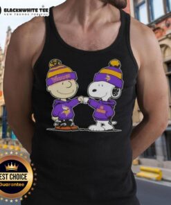 Alt Text: Charlie Brown and Snoopy fist bump in Minnesota Vikings tank top, celebrating Peanuts fandom and football spirit.