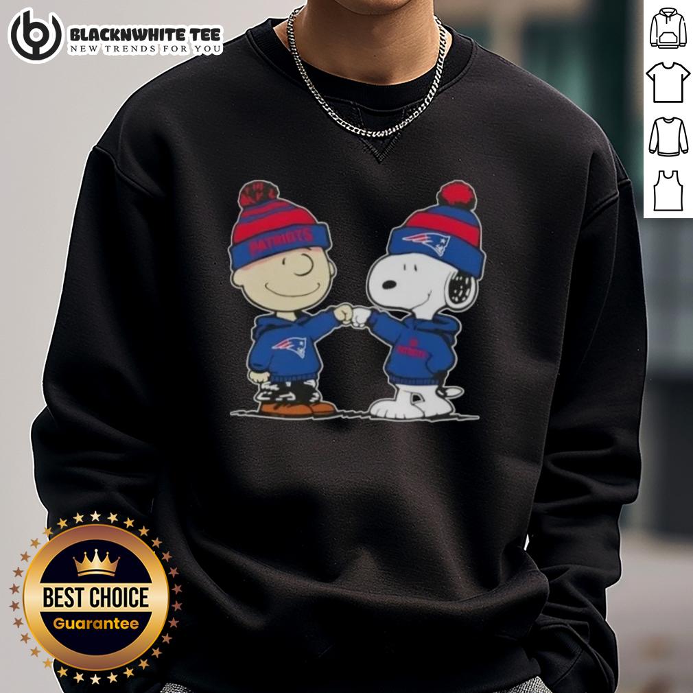 Nice Peanuts Charlie Brown Fist Bump Snoopy X New England Patriots Football Sweatshirt Alt Text: Charlie Brown and Snoopy fist bump in a Nice Peanuts sweatshirt featuring New England Patriots football design.