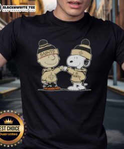 Nice Peanuts Charlie Brown fist bump with Snoopy on New Orleans Saints football t-shirt design.