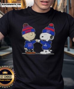 Nice Peanuts Charlie Brown and Snoopy fist bump in New York Giants football T-shirt design for fans.