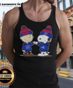 Charlie Brown and Snoopy fist bump on a New York Giants football tank top featuring Nice Peanuts design.
