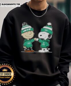 Charlie Brown and Snoopy fist bump in New York Jets football sweatshirt - Nice Peanuts themed design.