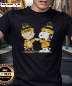Nice Peanuts Charlie Brown fist bump with Snoopy, featuring Pittsburgh Steelers logo on a football T-shirt.