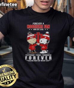 Alt Text: Snoopy in a hoodie smiling at fans, wearing an Atlanta Falcons X-Design T-shirt, perfect for Peanut lovers.