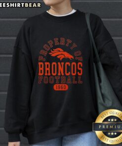 Cozy Denver Broncos sweatshirt featuring 'Nice Property of Denver Broncos Football Since 1960' design.