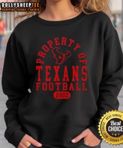 Cozy Houston Texans sweatshirt featuring the team logo, perfect for fans since 2002, ideal for game days and casual wear.