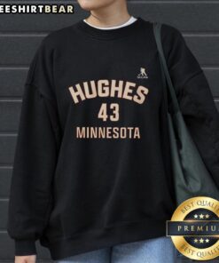 Quinn Hughes Minnesota 43 player sweatshirt featuring team colors and logo, perfect for fans and players alike.