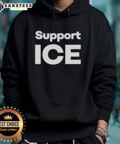 Scott Presler wearing a stylish 'Support Ice' hoodie, promoting unity and awareness in a vibrant outdoor setting.