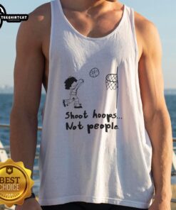 Person wearing a 'Nice Shoot Hoops Not People' tank top while playing basketball outdoors, showcasing a sporty vibe.