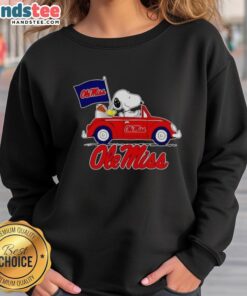 Alt Text: Snoopy and Woodstock driving Ole Miss Rebels football flag sweatshirt, perfect for fans of college sports apparel.