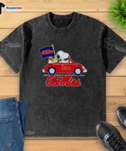 Nice Snoopy and Woodstock driving Ole Miss Rebels football flag on a washed t-shirt, perfect for game day style.