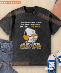Snoopy holding coffee in a humorous 'I Never Called You Stupid' t-shirt, perfect for casual and funny apparel lovers.