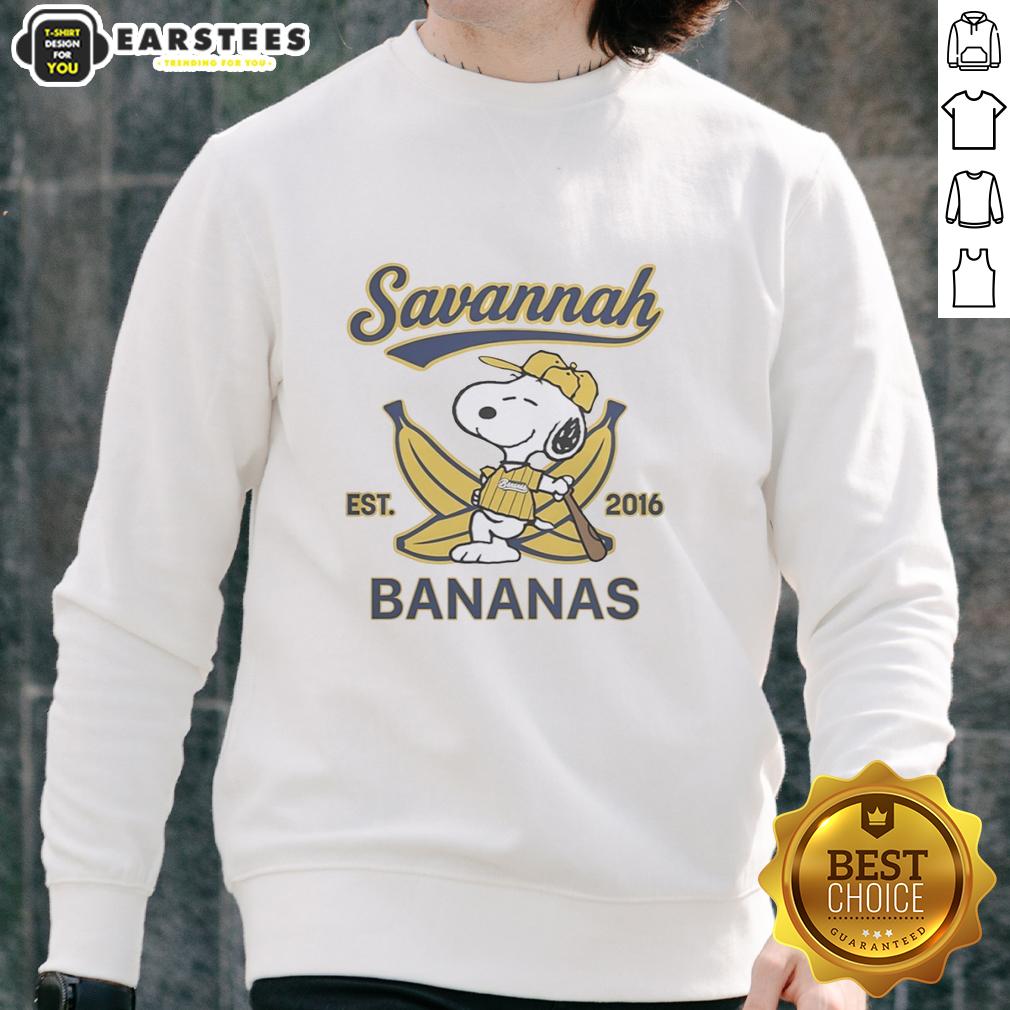 nice-snoopy-lying-on-banana-with-savannah-bananas-outfit-est-2016-sweatshirt Alt Text: Snoopy lying on a banana wearing a Savannah Bananas outfit, featuring the Est. 2016 sweatshirt design.