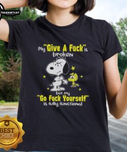 Funny Snoopy graphic on a ladies tee: 'My Give A F*ck Is Broken, But My Go F*ck Yourself Is Fully Functional.'