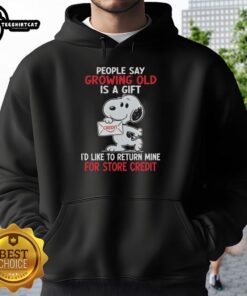 Alt Text: Funny hoodie featuring Snoopy with the quote 'Growing old is a gift, I'd like to return mine for store credit'.
