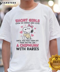 Alt Text: Cute Snoopy wearing a pink bow on a t-shirt for girls, perfect for sweet and sassy styles.