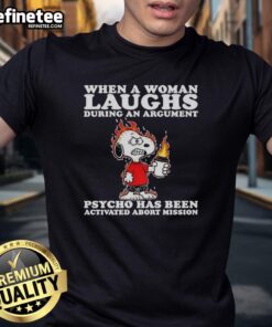 Funny Snoopy T-shirt design: 'When a woman laughs during an argument, Psycho activated - Abort Mission' humor.