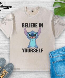 Alt Text: Cartoon 'Believe in Yourself' design on a washed t-shirt, showcasing positivity and stylish comfort for everyday wear.