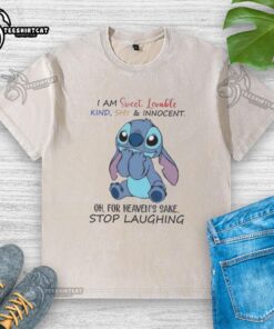 Cartoon graphic on a washed t-shirt featuring 'I Am Sweet, Lovable, Kind, Shy, and Innocent' text with playful design.