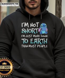 Cozy hoodie featuring 'I'm Not Short, I'm Just More Down to Earth Than Most People' text design.
