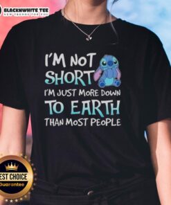 Stylish ladies' tee featuring 'I'm Not Short, I'm Just More Down to Earth' design for casual wear.