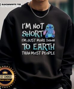 Trendy 'I'm Not Short, I'm Just More Down to Earth' sweatshirt featuring a stylish stitch design for casual wear.