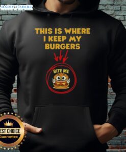Person wearing a 'Bite Me' hoodie, showcasing humor and style, perfect for burger lovers and casual wear.