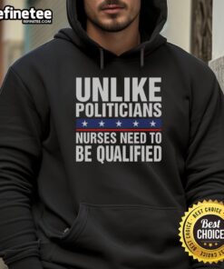 Humorous hoodie featuring 'Nice, Unlike Politicians, Nurses Need to Be Qualified' slogan, perfect for healthcare advocates.