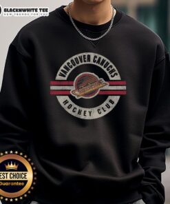 Vintage Vancouver Canucks sweatshirt featuring a classic design, perfect for fans and collectors of NHL apparel.