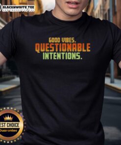 Alt Text: Stylish 'Nice Vibes Questionable Intentions T-Shirt' featuring a trendy design perfect for casual outfits.