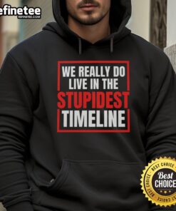 Vintage hoodie featuring 'We Really Do Live In The Stupidest Timeline' slogan, perfect for casual wear and humorous style.