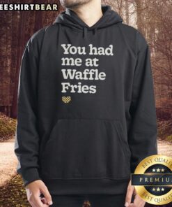 Cozy hoodie featuring 'You Had Me At Waffle Fries' text, perfect for fast food lovers and casual wear enthusiasts.