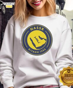 Official Al Nassr 1955 logo sweatshirt featuring vibrant colors and a stylish design for fans of the football club.