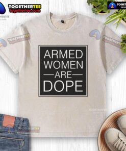 Official Alicia Garcia Armed Women Are Dope washed t-shirt featuring a bold graphic design celebrating women's empowerment.