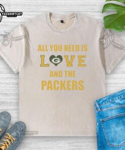 Official All You Need Is Love And The Green Bay Packers washed t-shirt in green, perfect for fans and casual wear.