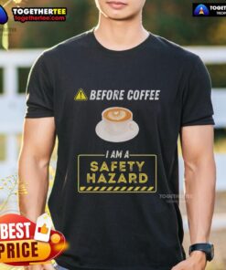 Funny coffee addict t-shirt with 'Before Coffee I Am A Safety Hazard' slogan, perfect for coffee lovers.