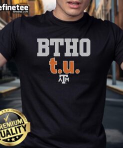 Alt Text: Official Btho Tu Texas A&M Aggies Football Logo T-Shirt featuring vibrant team colors and logo design.